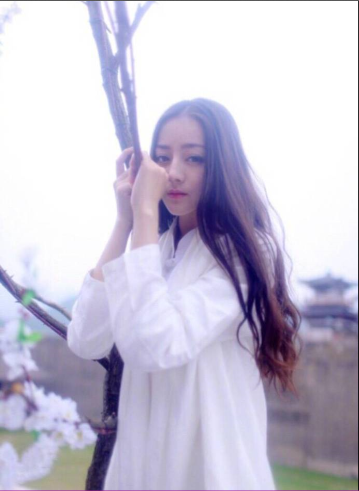 新疆美女明星迪丽热巴白色素衣古装写真 13