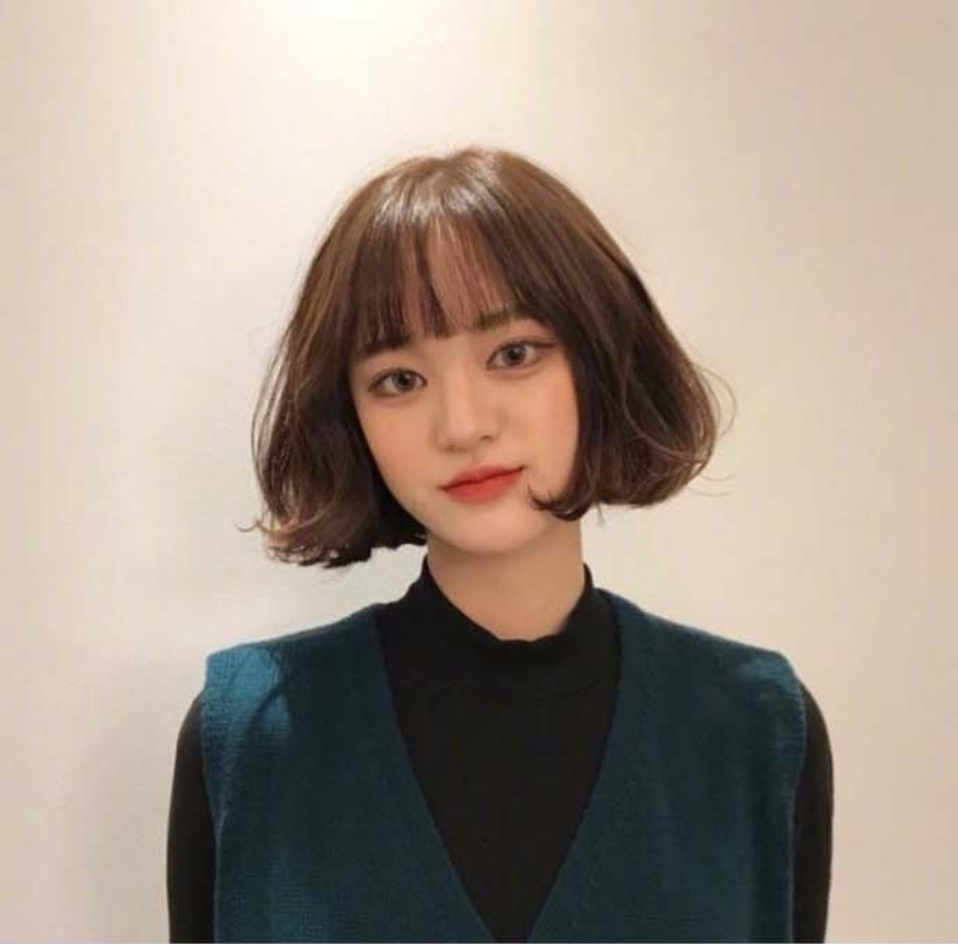 适合秋冬的棕色系大波浪卷发型美女自拍照 7