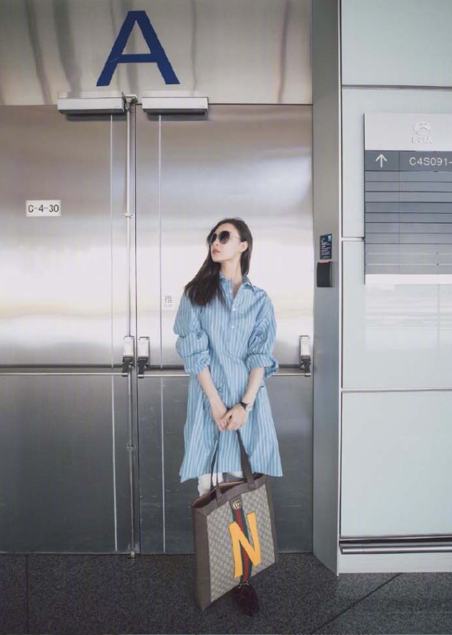 大眼美女明星倪妮机场街拍合集真是个大方舒适 45