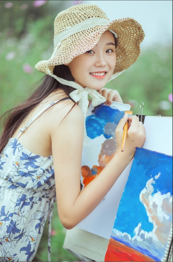 清纯文艺美女郊外写生图片 9