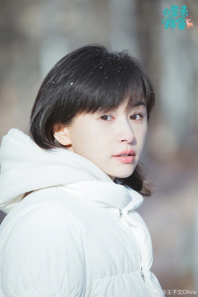 中国美女明星王子文白色羽绒服唯美写真图片 7