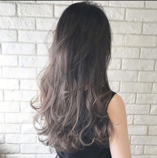 温柔女生空气感中长卷发发型图片