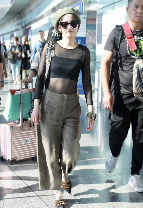 台湾美女图片 台湾小天后张韶涵透视装机场街拍 6